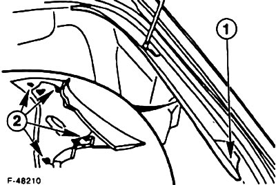 Наклоните спинку заднего сиденья вперед.