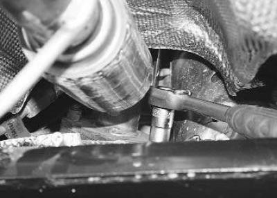 1. Place the vehicle on an inspection pit or lift.