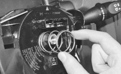7. …finally unscrew the bolt and remove the steering wheel.
