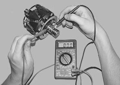 18. Press the bearing off the rotor shaft and install a new one, applying force to the inner race…