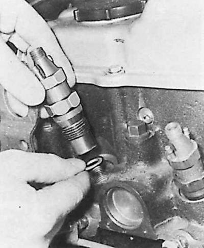 6. Извлечь шайбы термической изоляции и вытереть их.