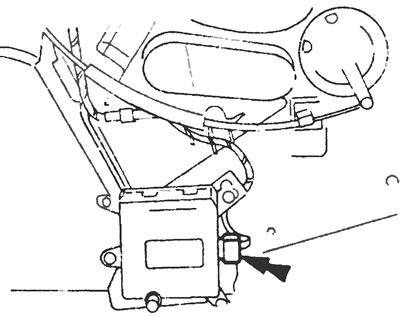 Рис. 10.25. Отсоедините штекер (указан стрелкой) от электродвигателя заслонок рециркуляции.