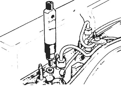 Рис. 10.9. Извлеките форсунки из головки блока цилиндров.