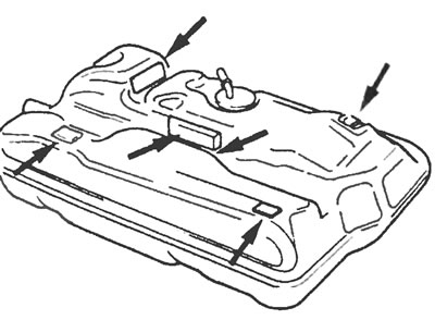 Рис. 16.11,б. Расположение подушек топливного бака (указаны стрелками) на моделях с длинной базой.