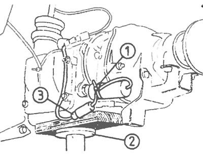 Рис. 12.6. Снятие электромагнитного клапана ускоряющей передачи: 1. Крепление (обвязка) троса; 2.…