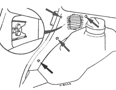 Рис. 11.4,а. Снимите отделочную панель передней ниши для ног (болты показаны стрелками) для того,…